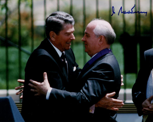 Autograph - 913903 - Signed photograph of Mikhail Gorbachev embracing ...